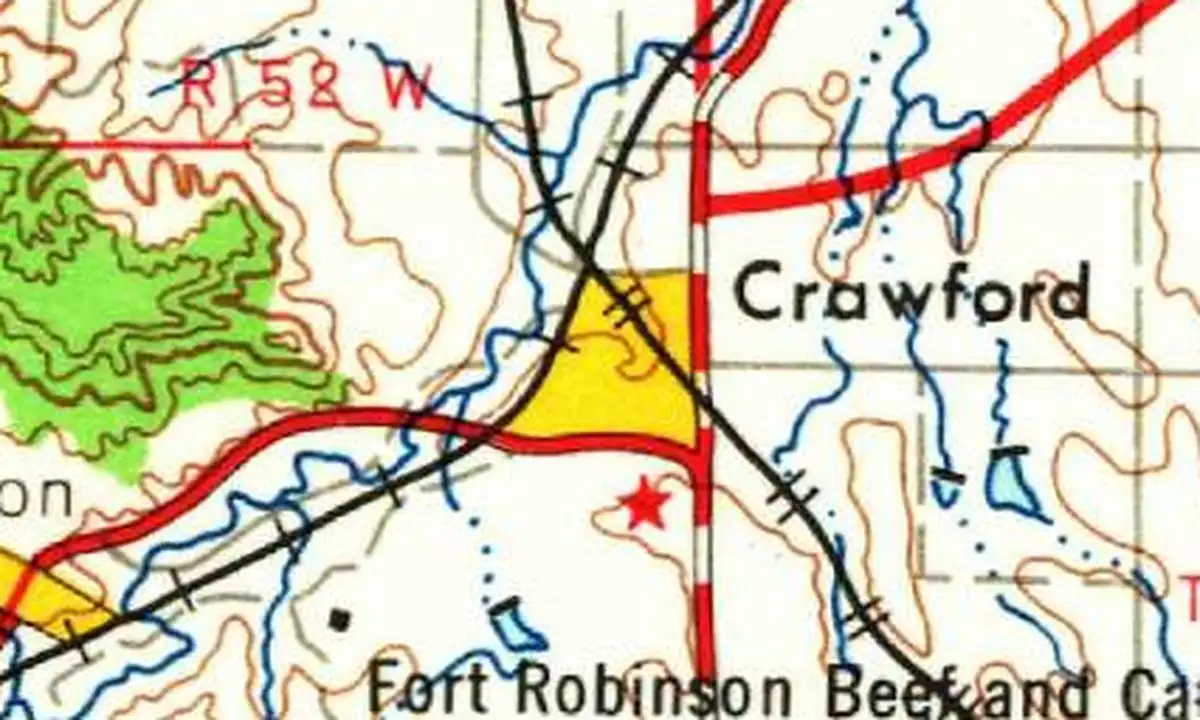 Detail of a 1955 U.S. Geological Survey map showing Crawford in yellow where railroads and highways meet, with Fort Robinson lands to the southwest
