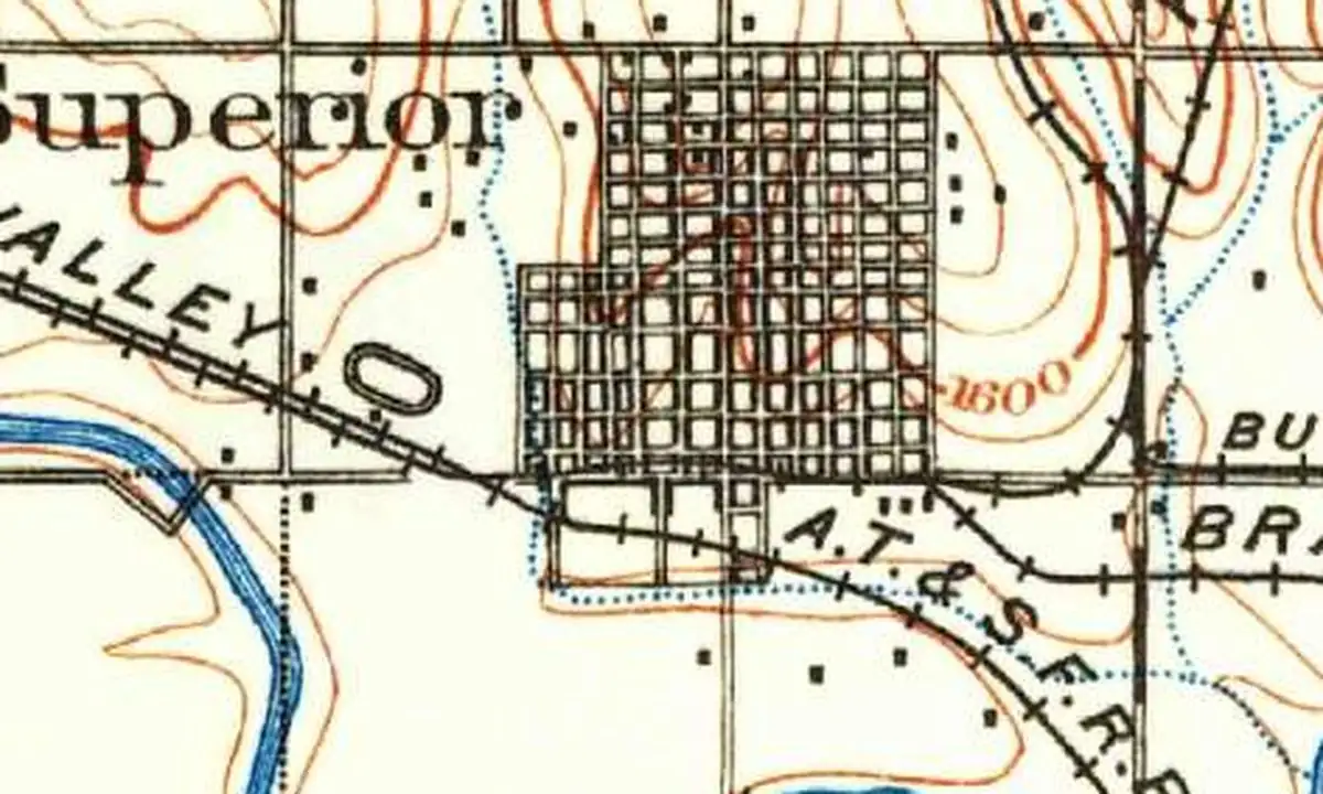 Detail of an 1898 U.S. Geological Survey map showing the street grid of Superior, with the Republican River to the west and several railroad lines, including the A. T. & S. F., crossing the south side of town